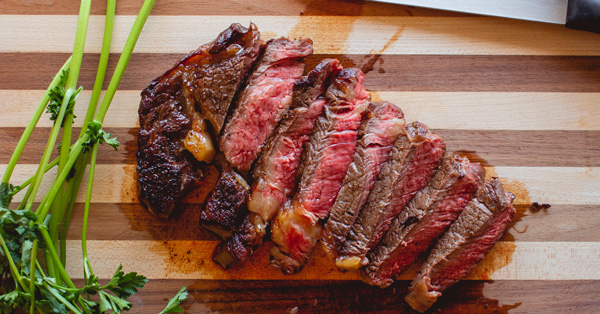 reverse sear steak on cutting board