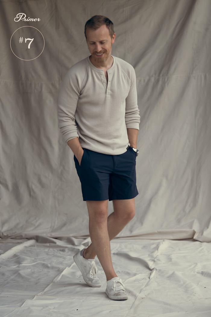 knit henley with tech shorts men outfit fashion