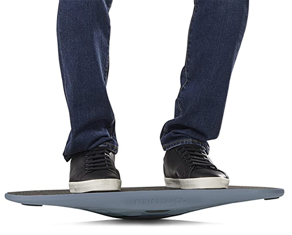 fluid balance board with legs standing on it