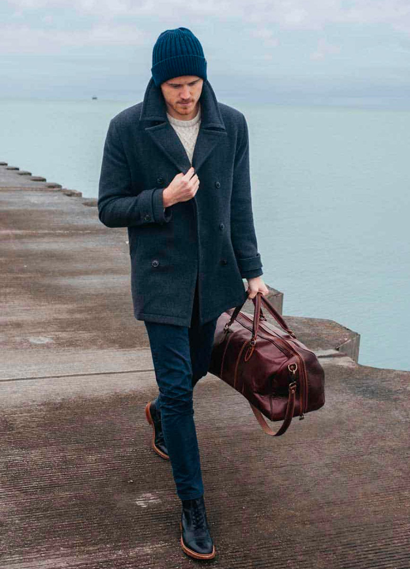 men's pea coat outfit with beanie and chinos
