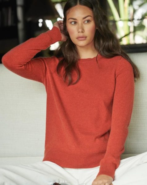 women wearing a red cashmere sweater from quince
