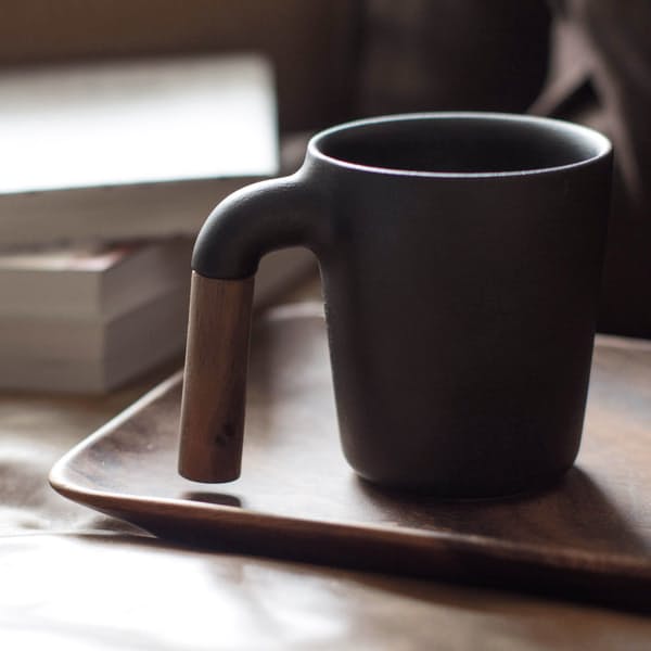 image of a dark gray ceramic mug