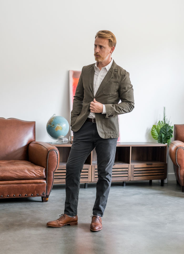 man wearing a blazer and chino pants outfit