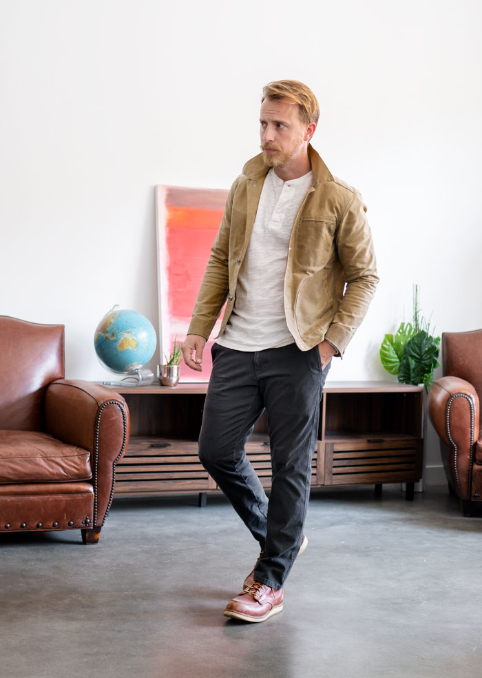 grey chino pants outfit with henley and trucker jacket