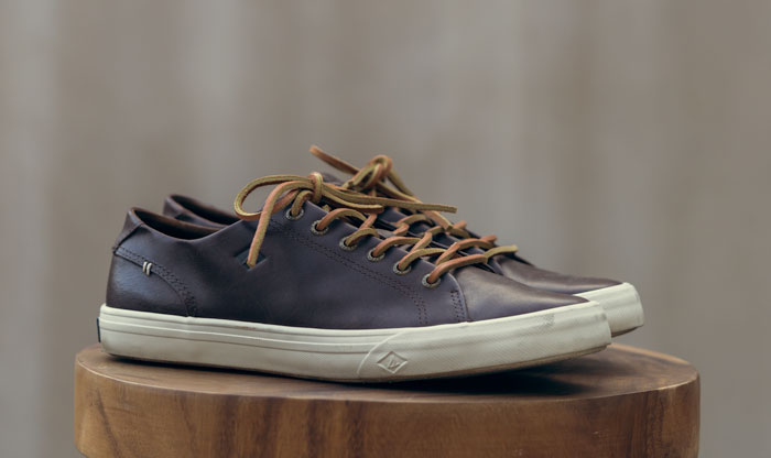 a pair of brown leather casual shoes