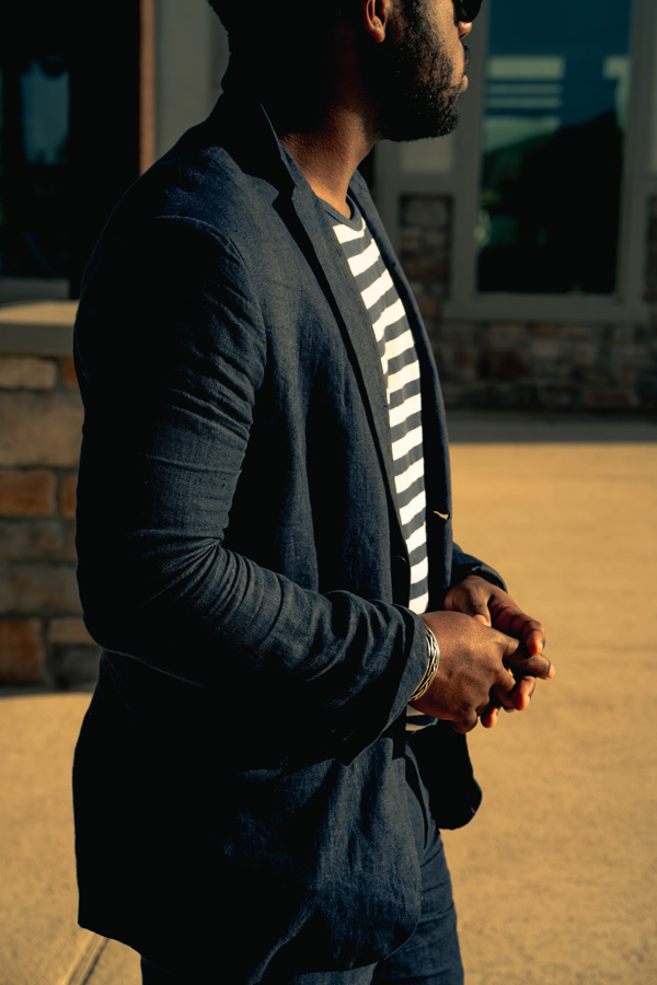 man in dressed down suit with t-shirt