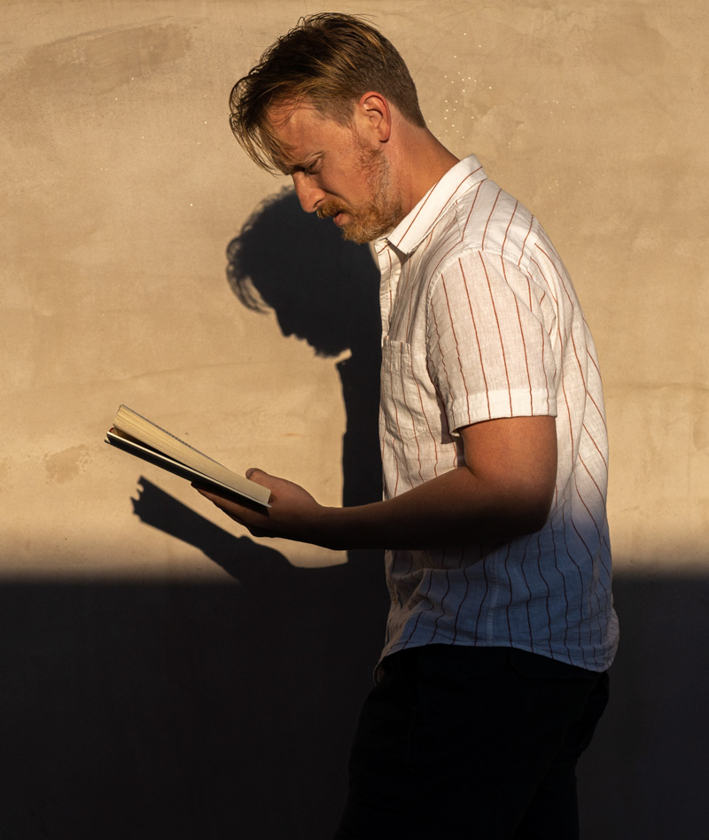 man reading book