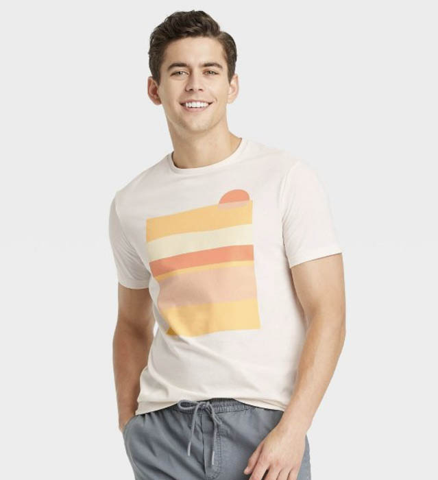 man wearing a printed short sleeve crewneck shirt