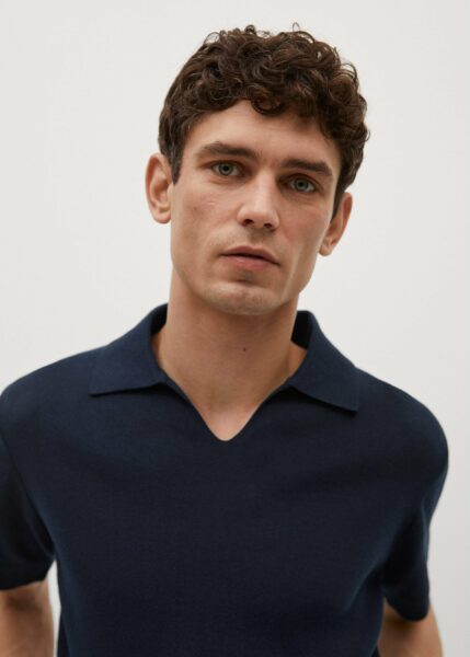 close up image of man wearing a knit cotton polo shirt