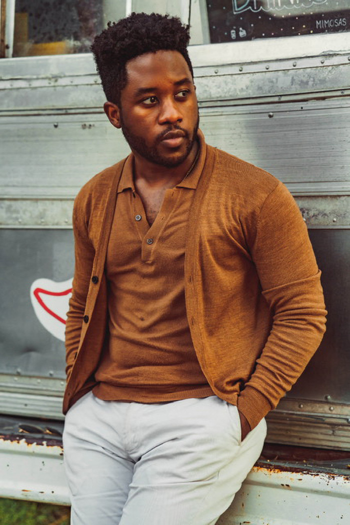 image of man wearing a brown knit polo shirt and matching brown cardigan sweater