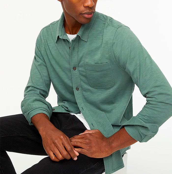 image of a man wearing a long sleeve knit button down shirt