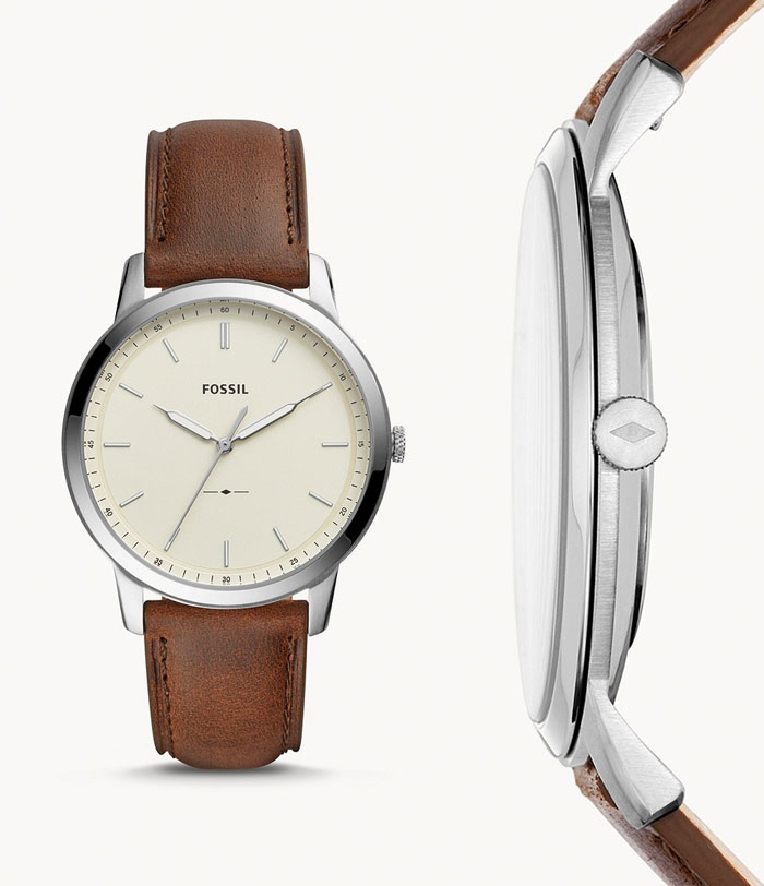 image of a thin watch from Fossil with brown leather strap and white face dial