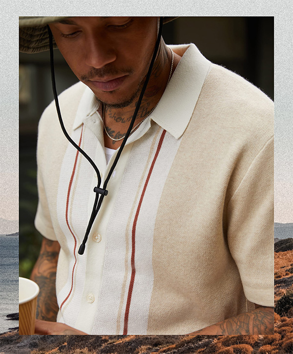 image of a cream short sleeve button up sweater polo shirt
