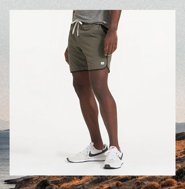 image of dark green shorts with black waistband and white drawstring tie