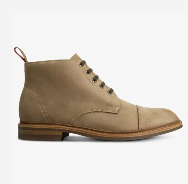 image of a suede cap toe boot