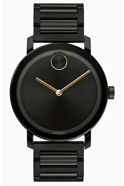 image of a black bracelet watch with gold hands