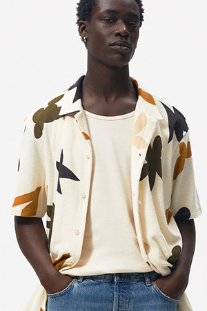 image of a man wearing a printed terry cloth shirt