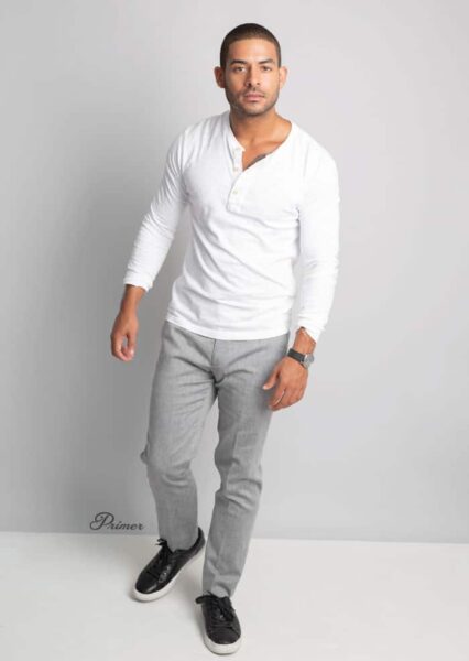 image of a man wearing a white shirt and grey pants