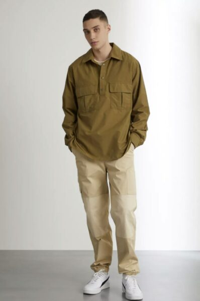 image of a man wearing a utility style shirt