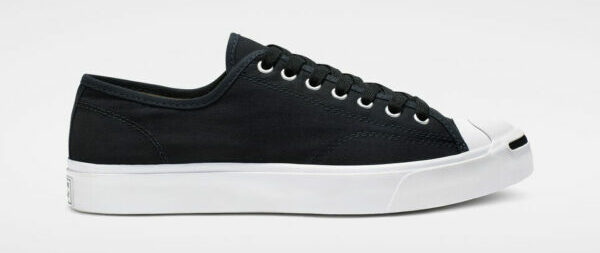 image of a black and white low top sneaker shoe