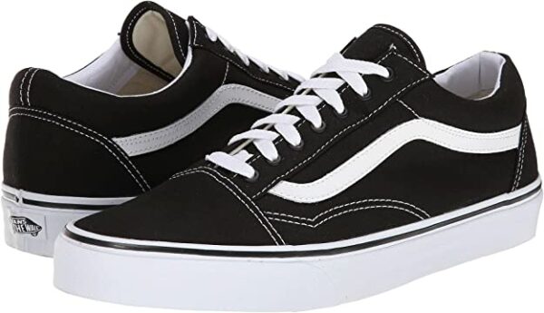 image of a pair of black and white low top sneaker shoes