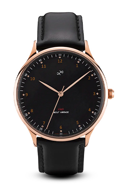 image of a rose gold and black leather watch