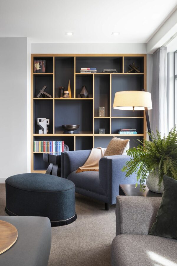 image of shelves against a blue wall