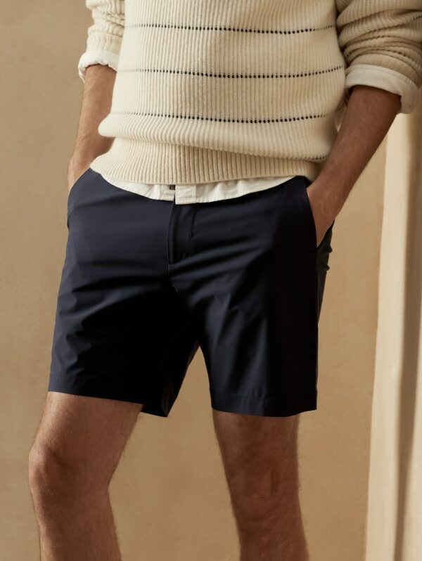 image of person wearing dark blue shorts