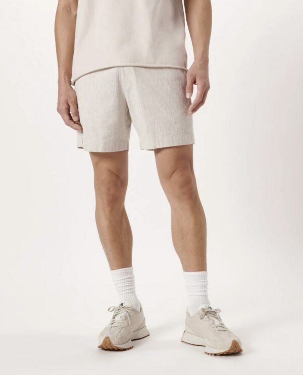 image of a person wearing white linen shorts