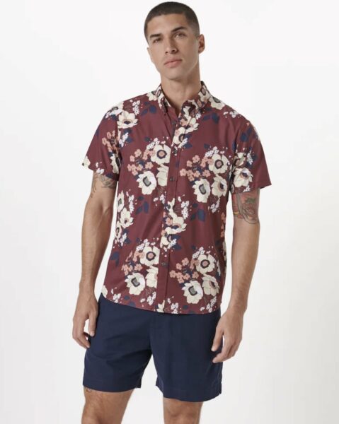 image of a man wearing a red floral printed shirt