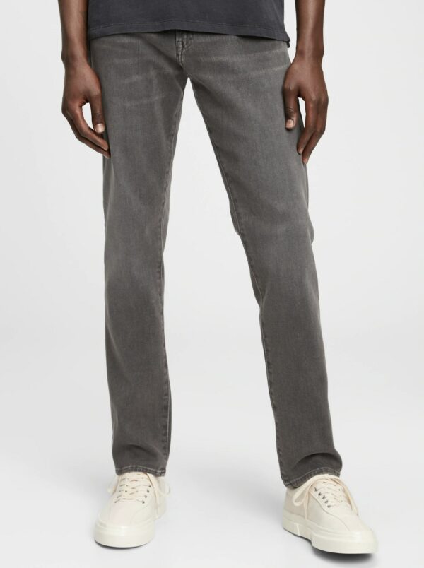 image of person wearing grey jeans