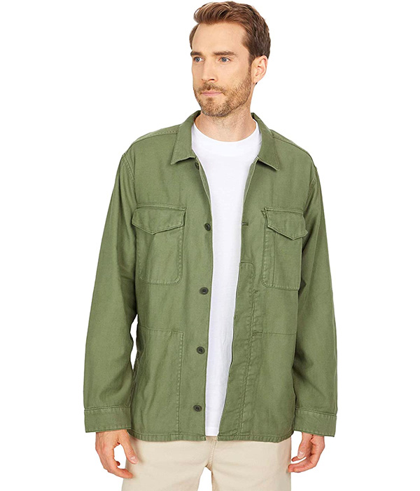 image of a man wearing a green jacket over a white shirt