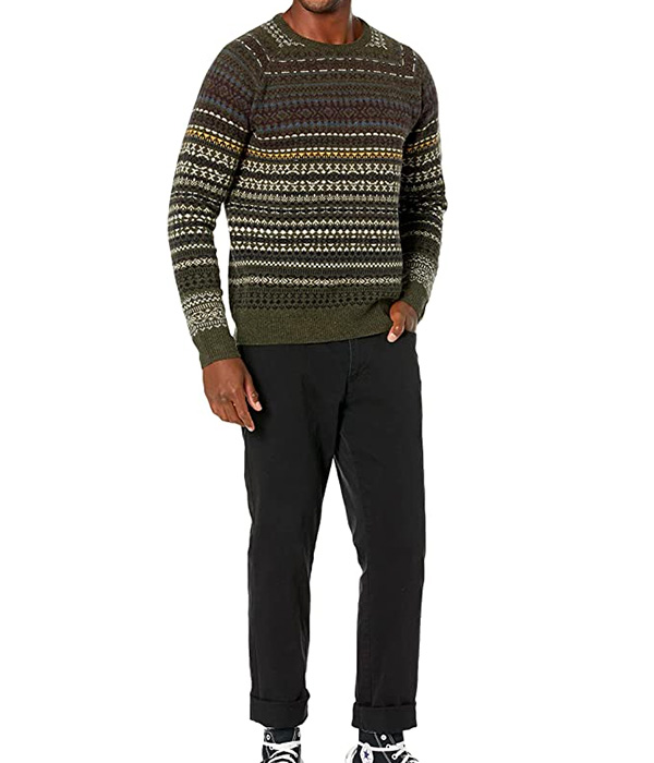 image of a person wearing a crewneck sweater and slim fit pants