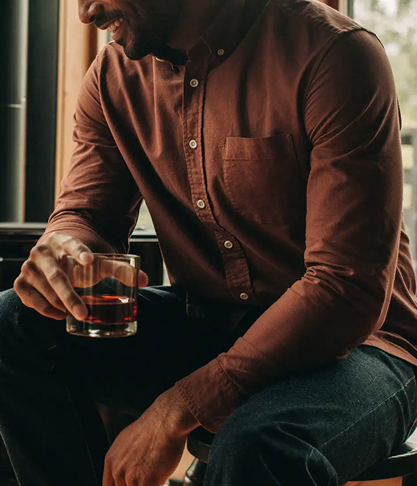 image of a dark brown oxford long sleeve shirt