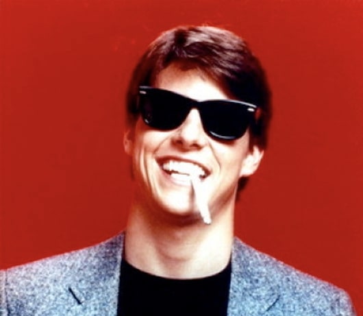 image of a man wearing dark wayfarer style sunglasses