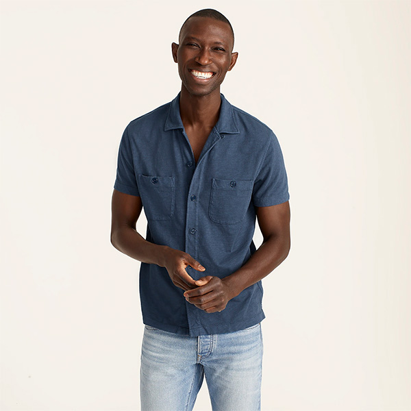 image of a man wearing a short sleeve blue shirt