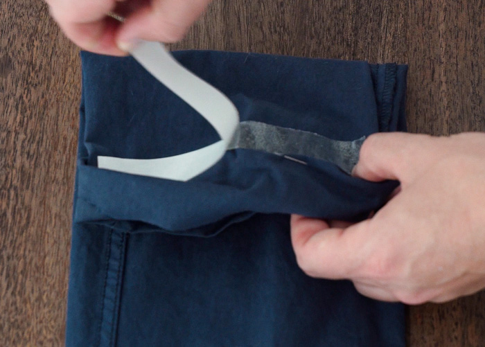 using fabric tape to hem pants