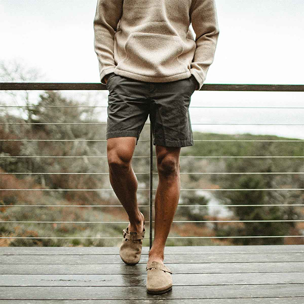 image of a person wearing a long sleeve shirt and shorts