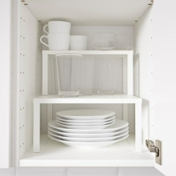 a pantry shelf organizer with serve ware