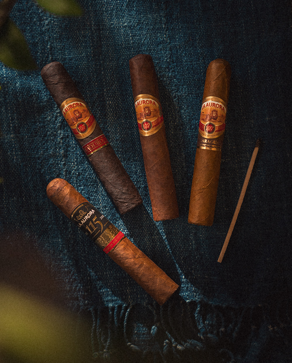 4 cigars of different colors