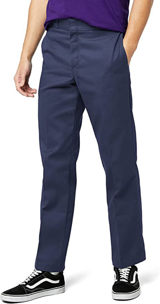 a person wearing blue work pants