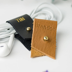  two leather cord keeper holder