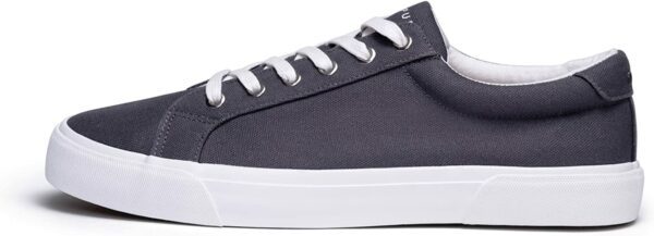 a grey and white canvas low top sneaker