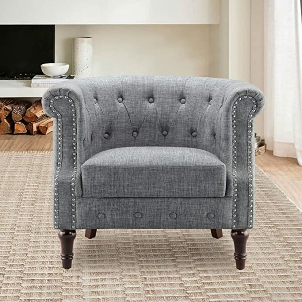 a tufted barrel style chair