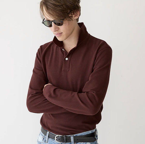 man wearing red long sleeve polo
