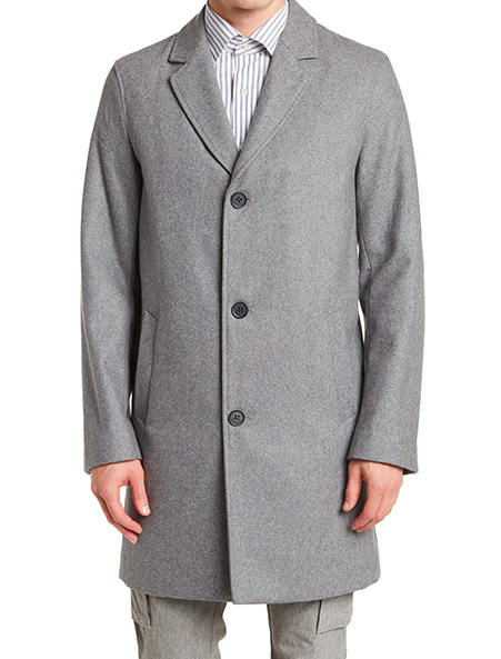a man wearing a long grey topper coat