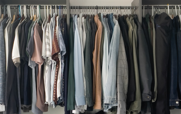 shirts hanging in a closet