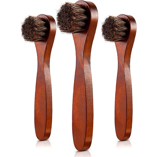 a set of three horse hair shoe polish brushes