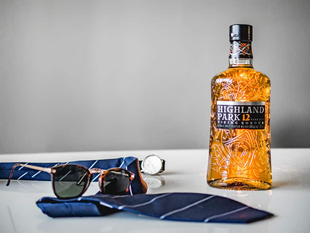 highland park scotch whisky next to sunglasses