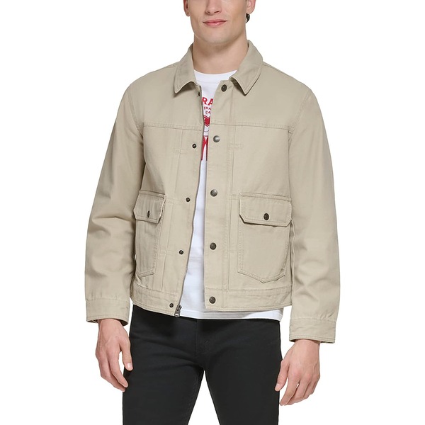 a man wearing a trucker style shirt jacket